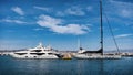 Engine vs. sails - yachts in Flisvos Marina
