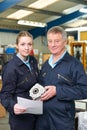Engineer And Apprentice With Component In Factory Royalty Free Stock Photo
