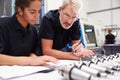 Engineer And Apprentice Planning CNC Machinery Project Royalty Free Stock Photo