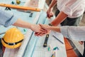 Engineer and architect partners team work join hands together. group people hands were collaboration to trust in business Royalty Free Stock Photo