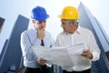 Engineer architect two expertise team plan hardhat