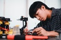 Engineer Asian Students Assembling Robotics Kits. Learning Mechanical Control, Robotics combines computer, electrical, mechanical Royalty Free Stock Photo