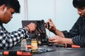 Engineer Asian Students Assembling Robotics Kits. Learning Mechanical Control, Robotics combines computer, electrical, mechanical Royalty Free Stock Photo