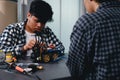 Engineer Asian Students Assembling Robotics Kits. Learning Mechanical Control, Robotics combines computer, electrical, mechanical Royalty Free Stock Photo