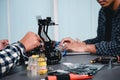 Engineer Asian Students Assembling Robotics Kits. Learning Mechanical Control, Robotics combines computer, electrical, mechanical Royalty Free Stock Photo