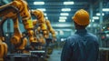Engineer Monitoring Robotic Automation AIG41