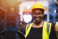 Engineer black women worker, Professional woman afican mechanical maintenance work in factory Royalty Free Stock Photo