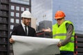 Engineer and builder swear conflict  deal trouble rework Royalty Free Stock Photo