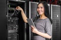 Engineer businesswoman in network server room Royalty Free Stock Photo