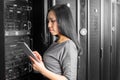 Engineer businesswoman in network server room Royalty Free Stock Photo