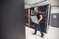 IT Engineer Carrying Blade Server While Walking In Datacenter Royalty Free Stock Photo