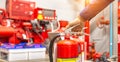 Engineer checking Industrial fire control system,are checking fire extinguishers. Royalty Free Stock Photo