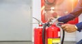 Engineer checking Industrial fire control system are checking fire extinguishers. Royalty Free Stock Photo