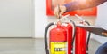 Engineer checking Industrial fire control system are checking fire extinguishers. Royalty Free Stock Photo