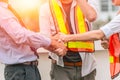 Engineer Constructor Teamwork Handshaking deal project together