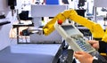 Engineer control automation yellow Modern Robot system in factory