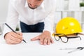 Engineer correcting mistake Royalty Free Stock Photo