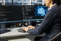 Engineer in data center optimizing hardware for artificial intelligence tasks Royalty Free Stock Photo