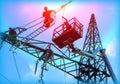 Engineer Electrician Workers On Lift Repairing Electricity Pylon Powerline And Wires