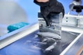 Engineer factory worker electronics works with a chip board. Microchip Production, Nano computer Technology and manufacturing Royalty Free Stock Photo