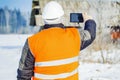 Engineer filmed with tablet PC destroyed building Royalty Free Stock Photo