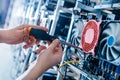 IT engineer fixing computer server on bitcoin and crypto currency mining farm Royalty Free Stock Photo