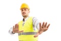 Engineer or foreman acting scared defending gesture