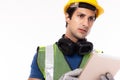 Engineer or foreman in hardhat using tablet computer in factory. Engineer or professional contractor use digital tablet computer