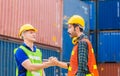 Engineer and foreman worker handshake with blurred construction site, Success and Teamwork concept Royalty Free Stock Photo