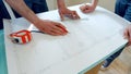 Engineer hand sketching construction project with hand. Royalty Free Stock Photo