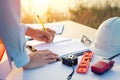 Engineer hand sketching a construction project with Pencil