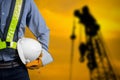 Engineer holding white helmet Royalty Free Stock Photo