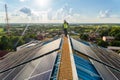 An engineer inspect solar panels on the roof, Maintenance solar roof, solar power