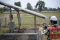 Engineers are working on inspecting solar power generation equipment. Royalty Free Stock Photo