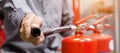 Engineer inspection Fire extinguisher in control room Royalty Free Stock Photo