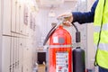 Engineer inspection Fire extinguisher in control room Royalty Free Stock Photo