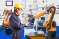 Engineer install and testing industry robotic in manufacturing Royalty Free Stock Photo