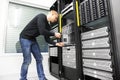 IT engineer installs blade server in datacenter Royalty Free Stock Photo
