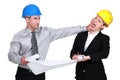 Engineer jealous of his colleague Royalty Free Stock Photo