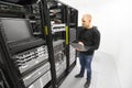 It engineer maintains servers in datacenter Royalty Free Stock Photo