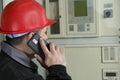 Engineer make call in power plant Royalty Free Stock Photo