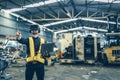 Engineer male using VR virtual reality technology in modern warehouse factory new innovation engineering Royalty Free Stock Photo