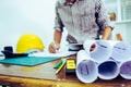 Engineer man and Architect drawings blueprint at Construction Site.office Project Management Royalty Free Stock Photo