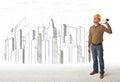 Engineer man with building city drawing in background Royalty Free Stock Photo