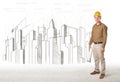 Engineer man with building city drawing in background Royalty Free Stock Photo