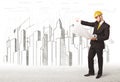 Engineer man with building city drawing in background Royalty Free Stock Photo