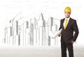 Engineer man with building city drawing in background Royalty Free Stock Photo