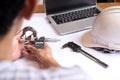 Engineer man hand measuring bearing with digimatic micrometer Royalty Free Stock Photo