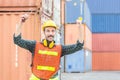 Engineer man in hard hat celebrating victory, foreman worker raise hands in celebration Royalty Free Stock Photo