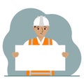 Engineer man holding a blank sheet of paper. The concept of a builder, engineer, planner or designer.